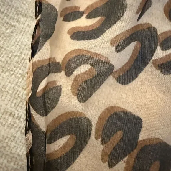Long oblong silk scarf/wrap in Tan & Brown Print. - Picture 4 of 4